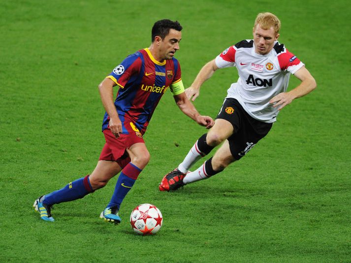 Paul Scholes og Xavi í úrslitaleik Meistaradeildarinnar í vor.