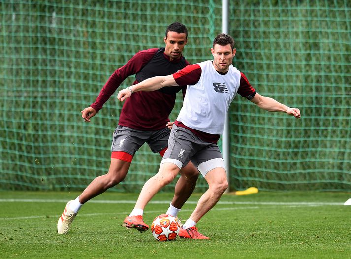 Matip og Milner á æfingu Liverpool.