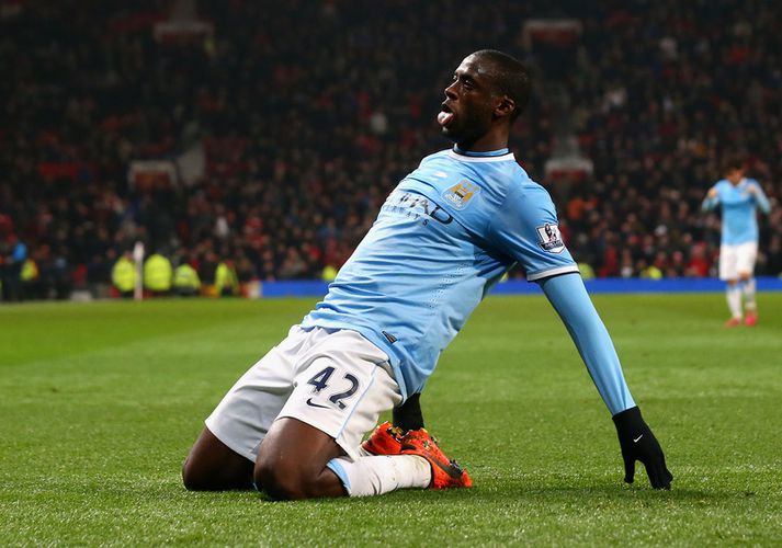 Yaya Toure fagnar marki í leik með Manchester City.