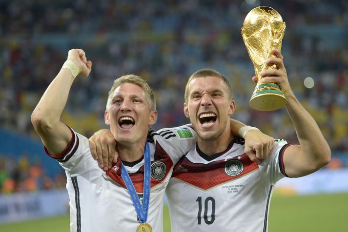 Bastian Schweinsteiger og Lukas Podolski fagna heimsmeistaratitlinum 2014. Sterkir karakterar sem Þjóðverjar söknuðu á HM 2018.