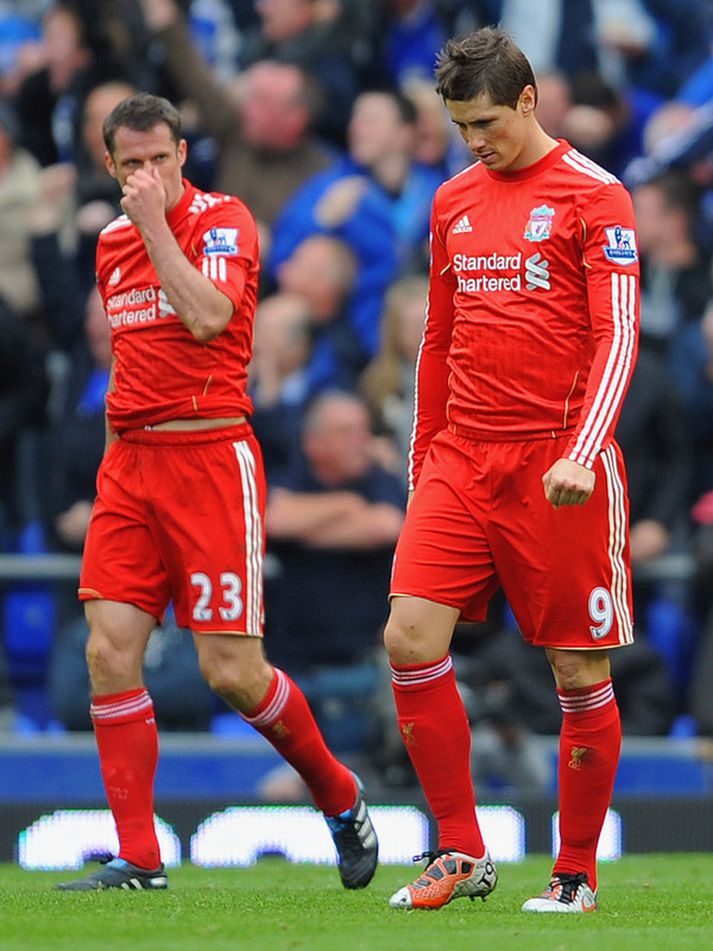 Jamie Carragher og Fernando Torres.
