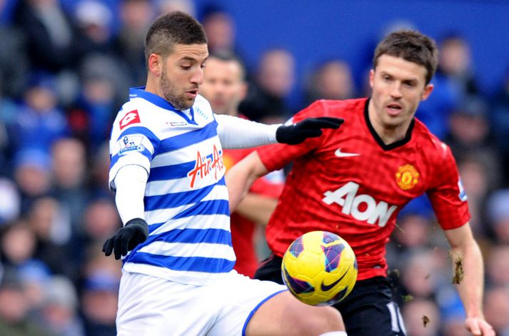 Taarabt í baráttu við Michael Carrick á síðustu leiktíð.