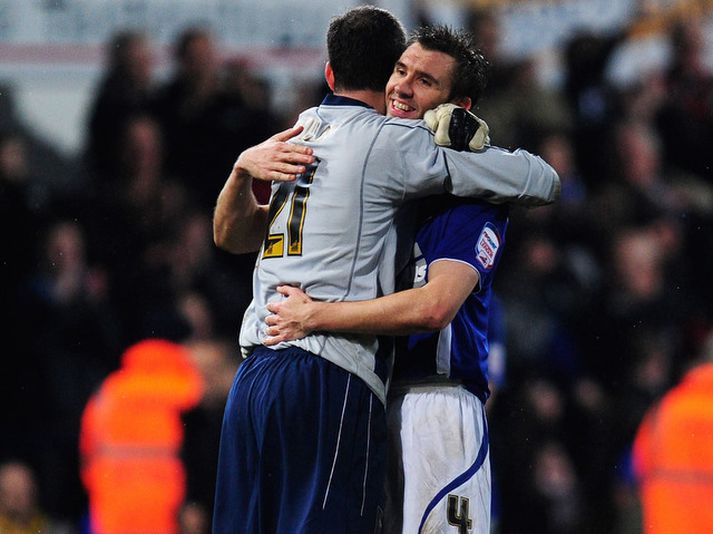 Gareth McAuley og Marton Fulop fagna sigri Ipswich í kvöld.