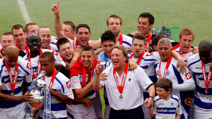 Neil Warnock á góðri stund með leikmönnum Queens Park Rangers.