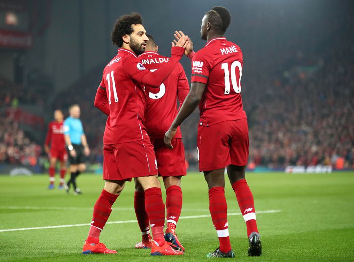 Mo Salah, framherji Liverpool og Mane fagna.