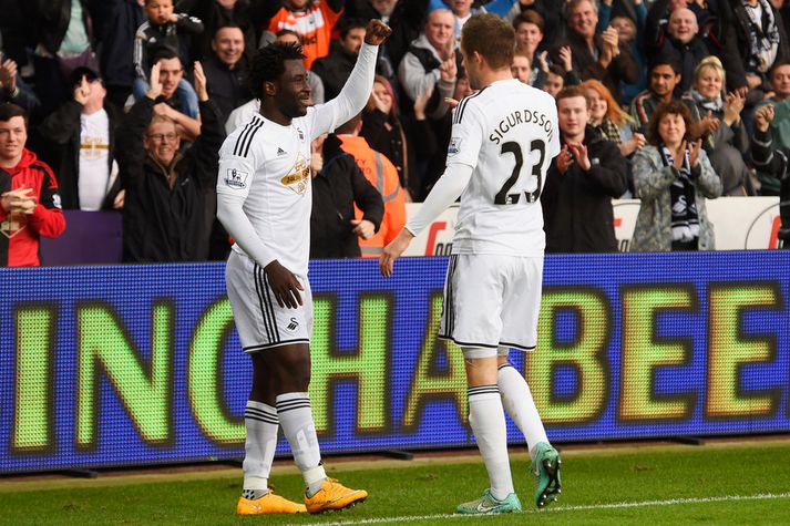Wilfried Bony og Gylfi Þór Sigurðsson fagna marki um síðustu helgi.
