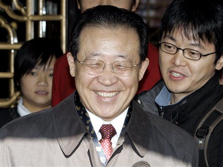 Kim Kye Gwan, varautanríkisráðherra Norður-Kóreu var eitt sólskinsbros þegar hann kom af fundi með starfsbróður sínum frá Suður-Kóreu í morgun.