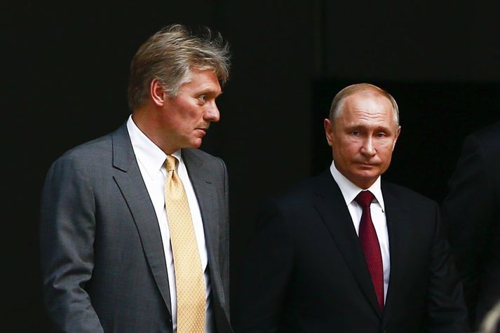 Dmitri Peskov og Vladimír Pútín Rússlandsforseti.