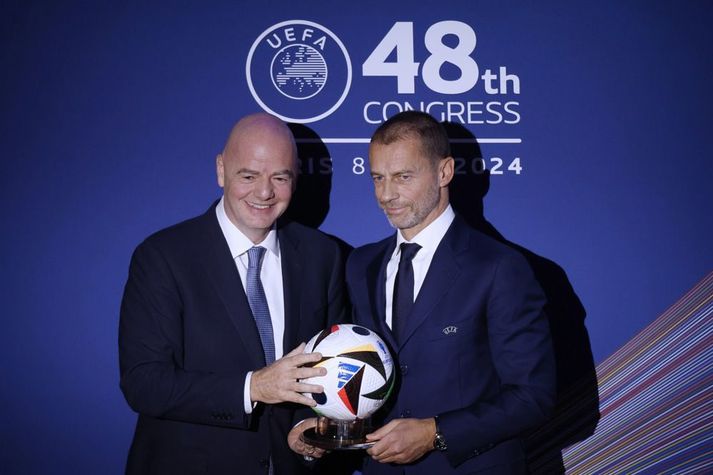 Gianni Infantino, forseti FIFA, (t.v.) og Aleksander Ceferin, forseti UEFA, (t.h.). Báðir hafa látið breyta reglum til að geta setið lengur í embætti þó að Ceferin hafi síðar dregið í land.