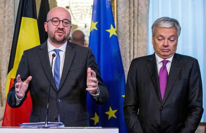 Charles Michel forsætisráðherra og Didier Reynders utanríkisráðherra á blaðamannafundi í Brussel.