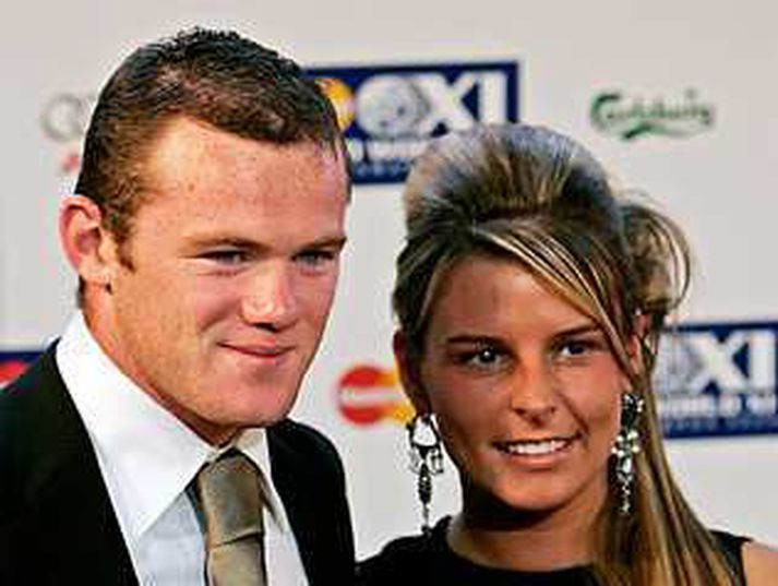 Rooney og kærastan synda í seðlunum.