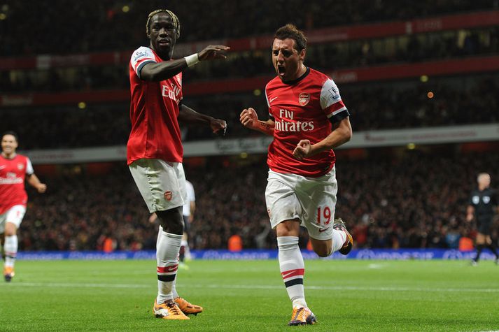 Santi Cazorla fagnar marki sínu ásamt Bacary Sagna