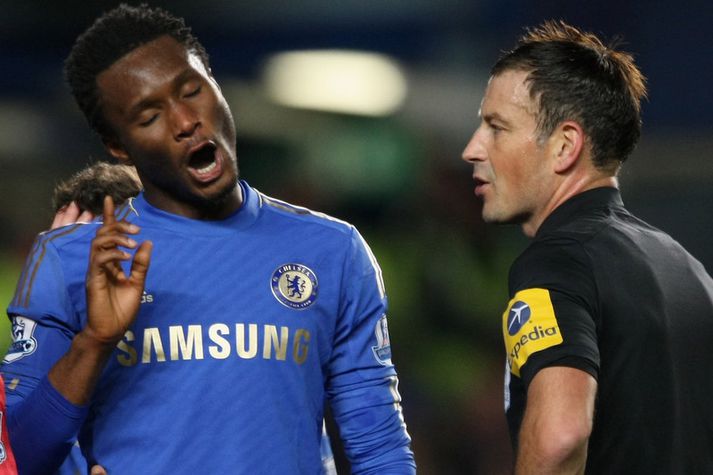 Mark Clattenburg og John Obi Mikel.