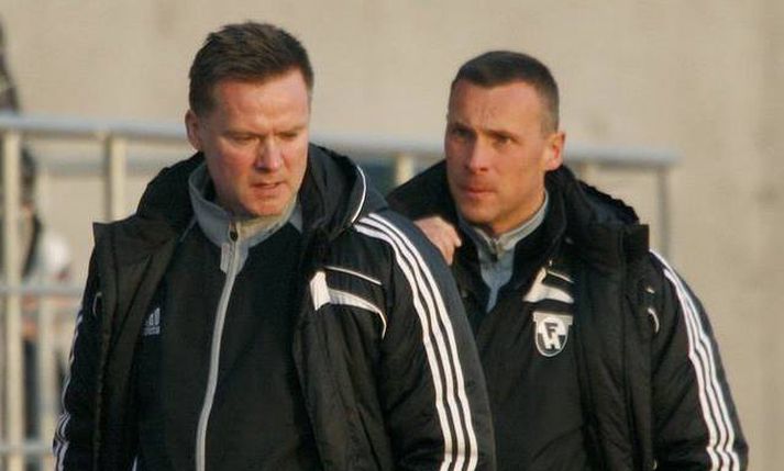 Heimir Guðjónsson, þjálfari FH, og Jörundur Áki Sveinsson, aðstoðarmaður hans.