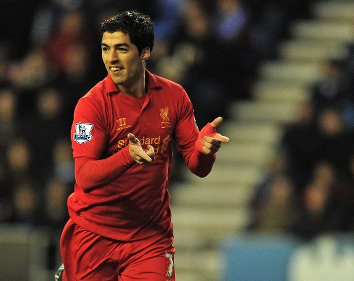 Luis Suarez hefur skorað 15 mörk í 10 leikjum í deildinni.