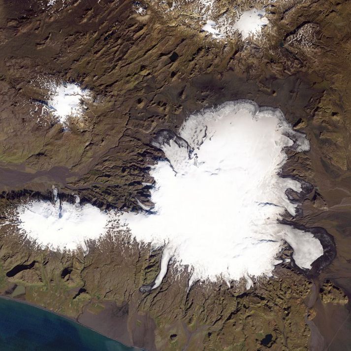 MÝRDALSJÖKULL GLACIER 2014 Sólheimajökull is the long outlet glacier on the southwest side of the ice cap. Eyjafjallajökull glacier is to the left (south).
