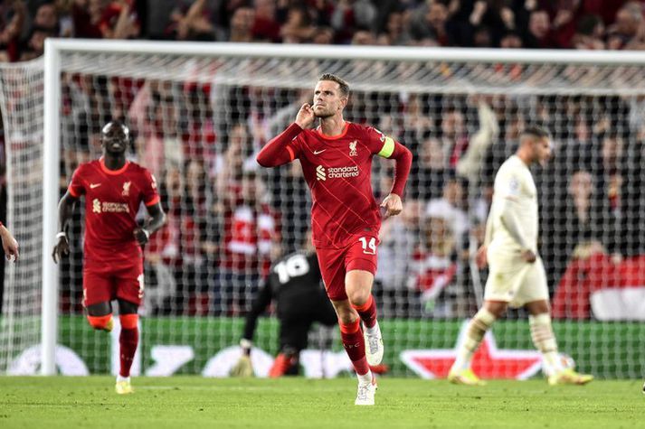  Jordan Henderson fagnar sigurmarki sínu fyrir Liverpool í gær.