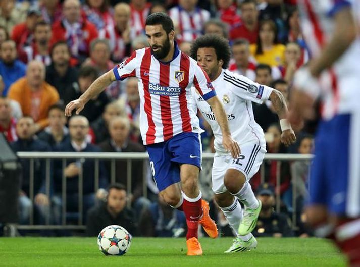 Arda með Marcelo á hælunum í Madrídar-slag Atletico og Real í vetur.