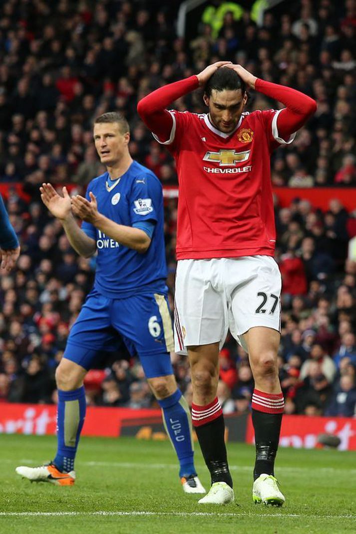 Marouane Fellaini og Robert Huth í leiknum umrædda.