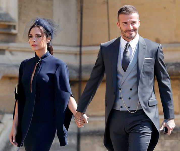 Hjónin Victoria Beckham og David Beckham í konunglega brúðkaupinu í sumar.