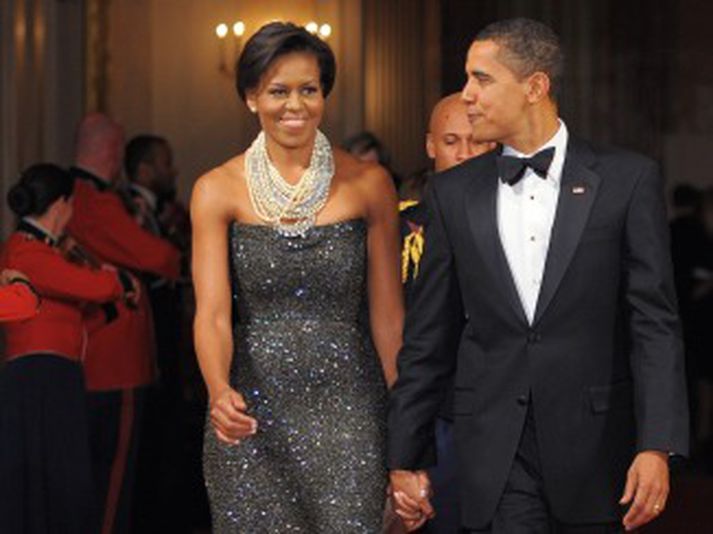 Obama hjónin í veislunni í gær. Mynd/ AFP.