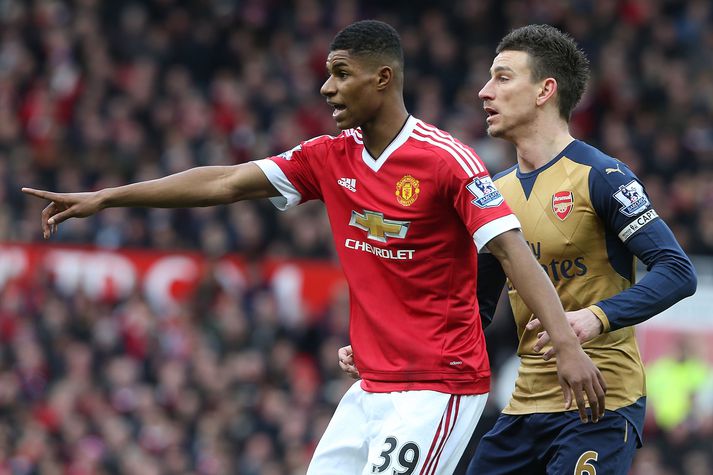 Rashford í baráttunni við Koscielny í dag.
