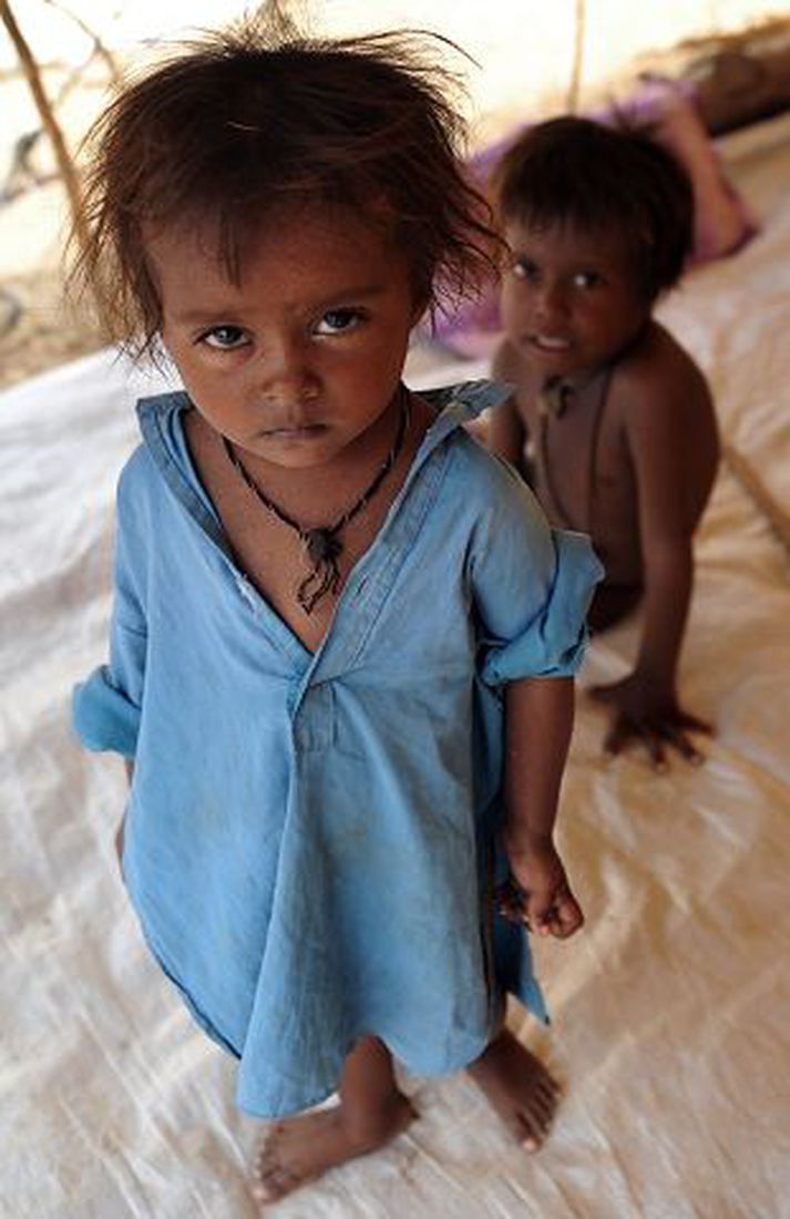 Mikil sjúkdómahætta er vegna flóðavatns sem þekur fimmtung lands í Pakistan.Nordicphotos/AFP