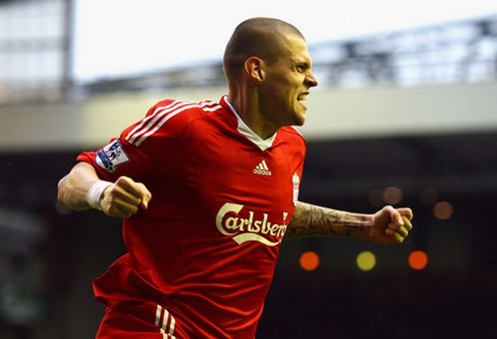 Martin Skrtel fagnar marki í leik með Liverpool.
