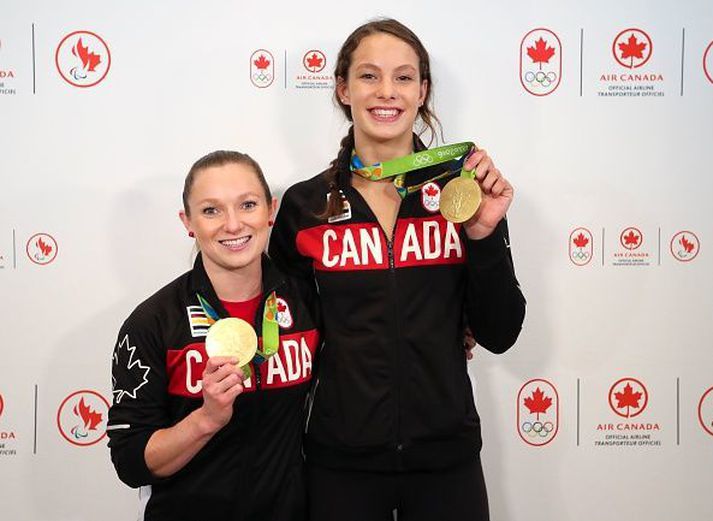 Rosie MacLennan og Penny Oleksiak munu ekki keppa á Ólympíuleikunum í sumar, fari þeir fram.