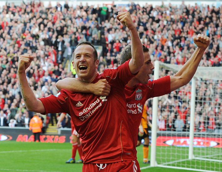 Dirk Kuyt í leik með Liverpool og Bolton á síðustu leiktíð.
