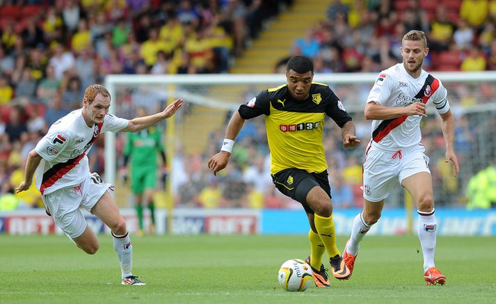 Troy Deeney í eldlínunni gegn Bournemouth í dag.
