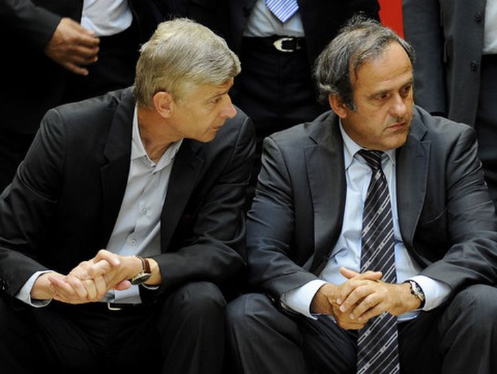 Arsene Wenger, stjóri Arsenal og Michel Platini, forseti UEFA.
