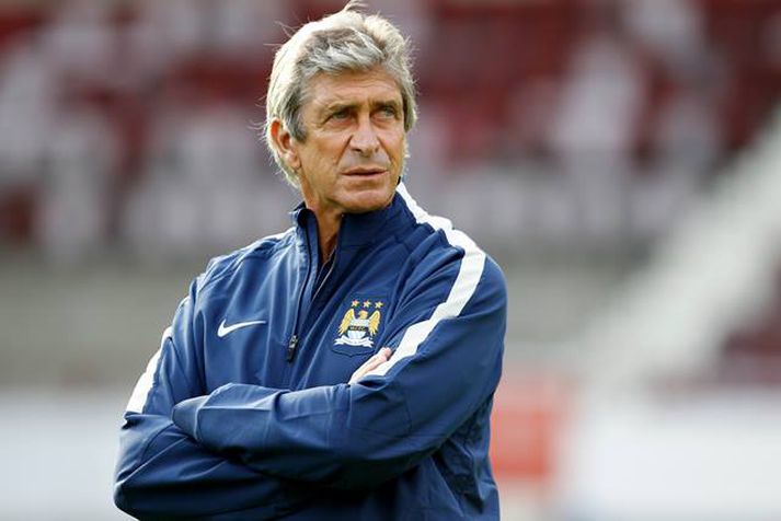 Manuel Pellegrini, þjálfari Englands- og deildarbikarmeistara Manchester City.
