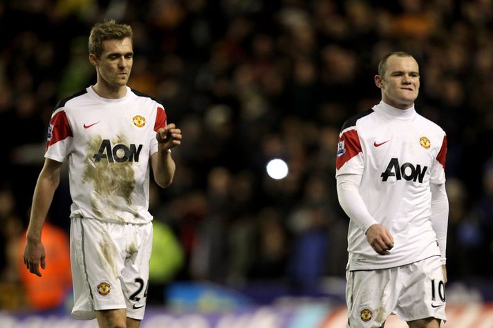 Fletcher og Rooney voru súrir eftir leik.