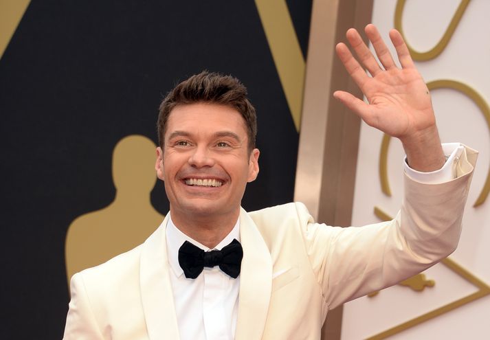 Ryan Seacrest er sakaður um að hafa káfað á kynfærum stílista síns og slegið hana á rasskinnina.