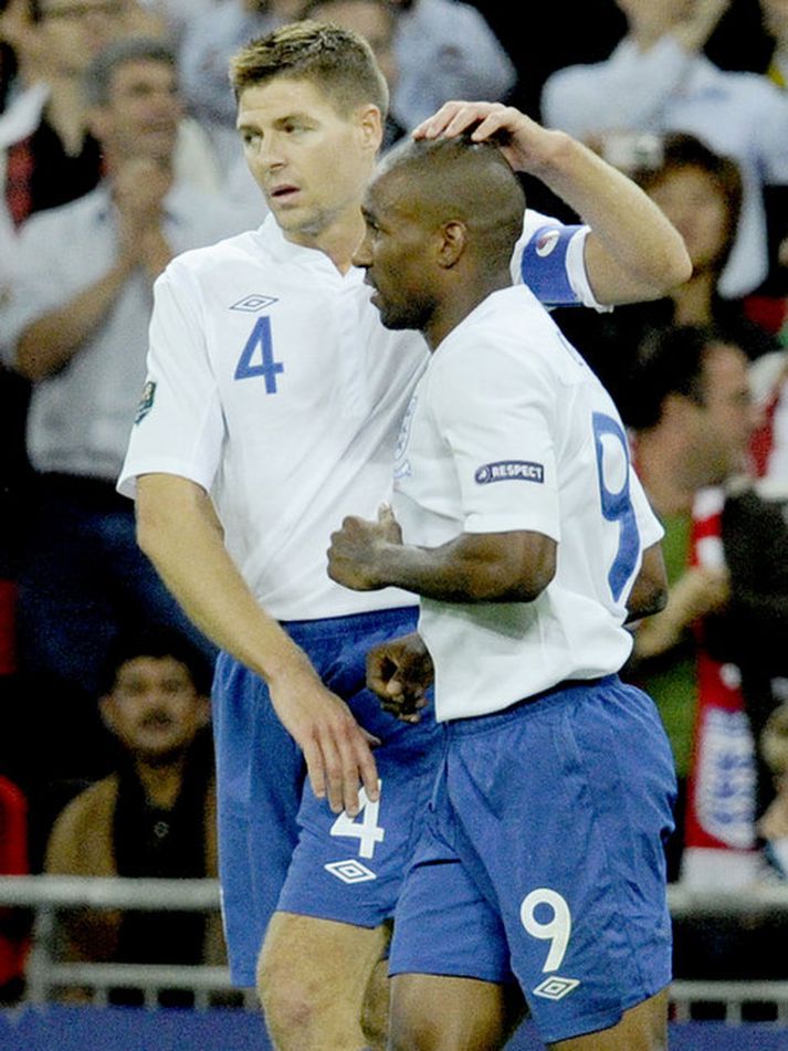 Steven Gerrard og Jermain Defoe.