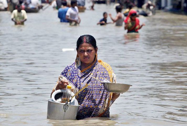 Þorpið Sirajganj í Bangladess hefur orðið einna verst úti í monsúnrigningunum í ár.