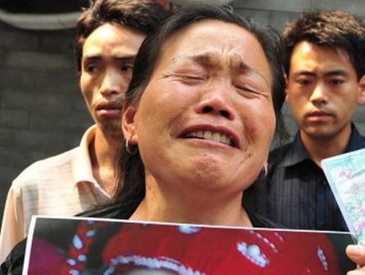 Ein mæðranna sem misstu barn vegna mjólkurinnar.