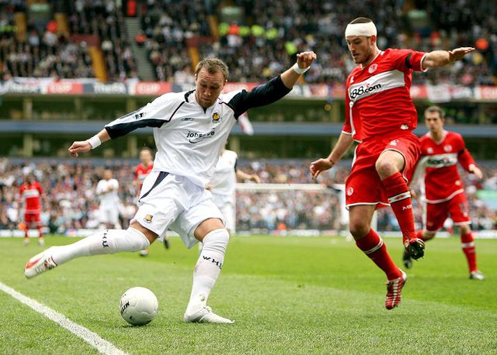 BIRMINGHAM, UNITED KINGDOM - APRIL 23:  Dean Ashton of West Ham United takes on Franck Queudrue of Middlesbrough (R) during the FA Cup Semi-Final match between West Ham United and Middlesbrough at Villa Park on April 23, 2006 in Birmingham,
England.  (Photo by Clive Brunskill/Getty Images)