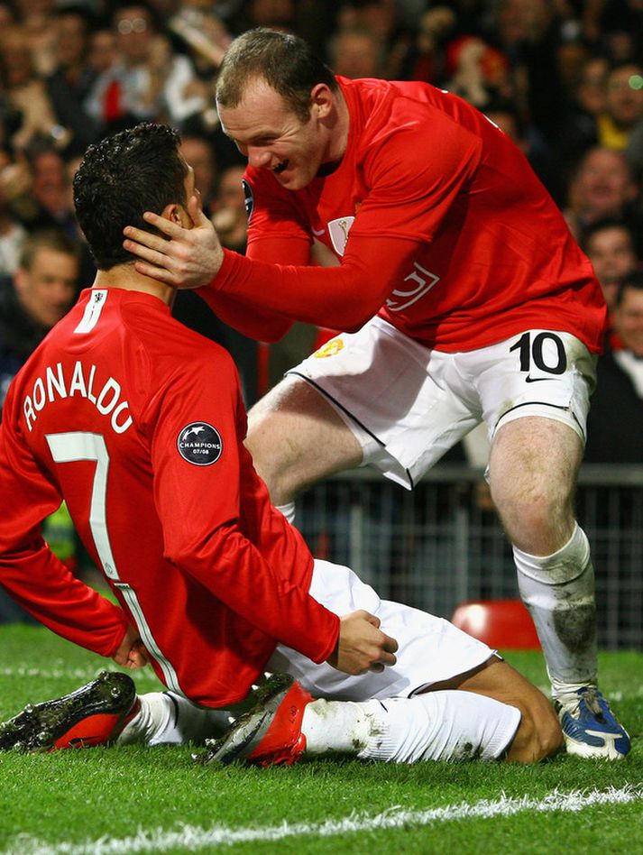 Cristiano Ronaldo og Wayne Rooney fagna marki fyrir Manchester United.