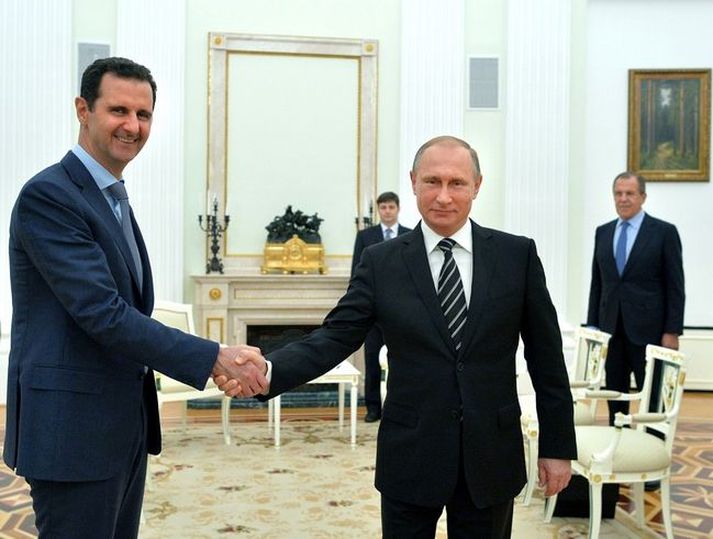 Bashar al-Assad og Vladimir Putin í Moskvu í gær.