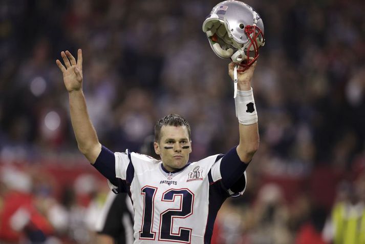 Andlitið á Tom Brady er á rassinum á ónefndum manni í Boston.