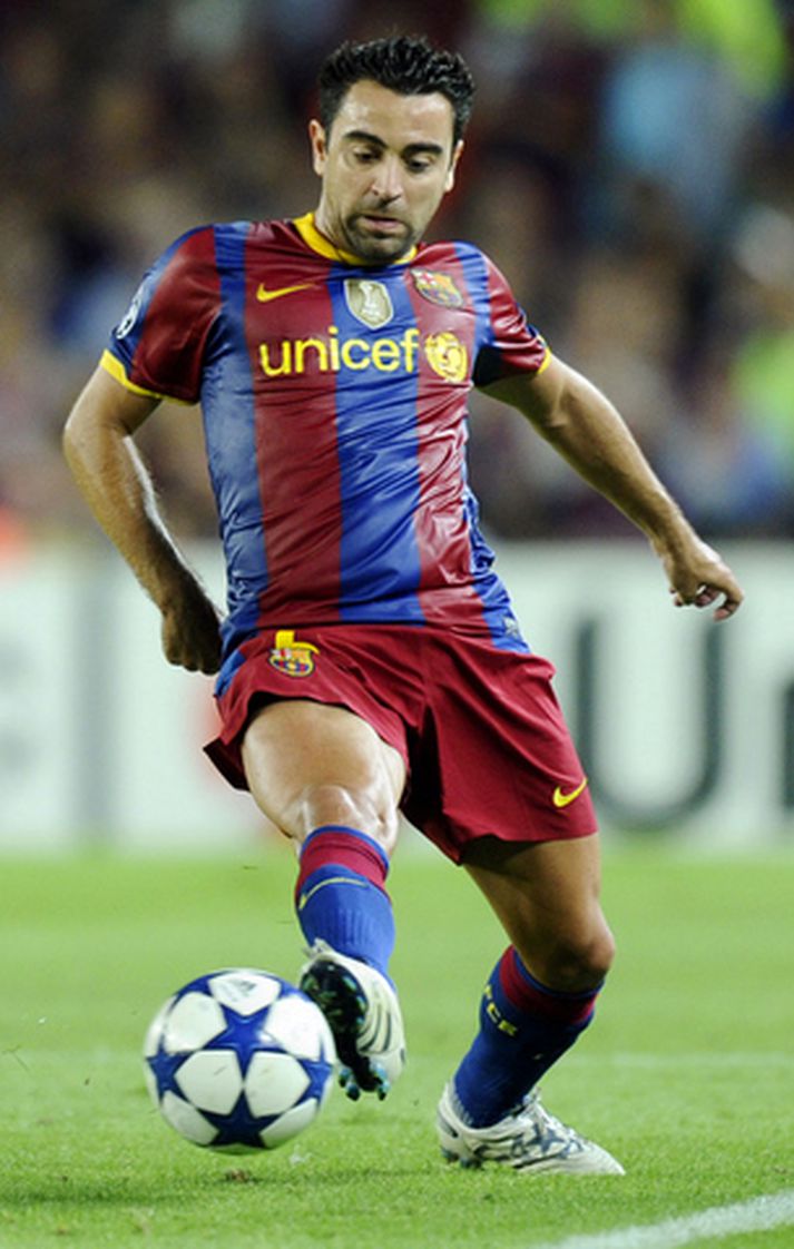 Xavi í leik með Barcelona.