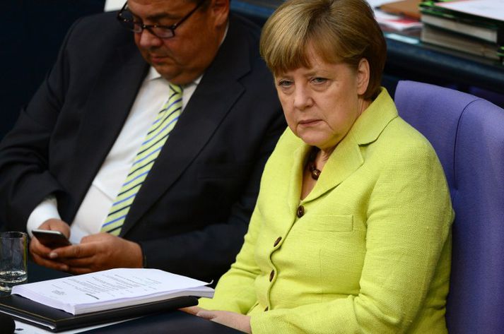 Angela Merkel Þýskalandskanslari segir óhugsandi að Rússar snúi aftur í G8-hópinn að svo stöddu.