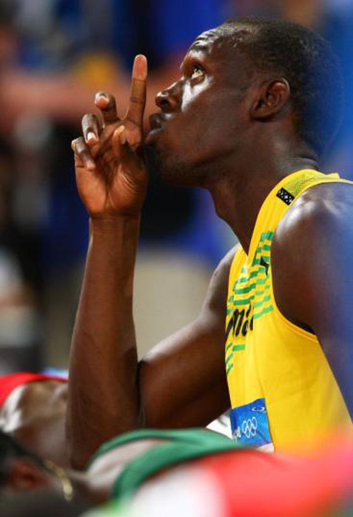 Bolt vann í ótrúlegu úrslitahlaupi í 100 metra hlaupi karla.