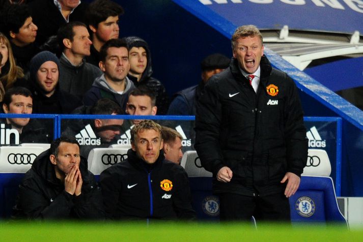 David Moyes, knattspyrnustjóri Manchester United, við hlið aðstoðarmanna sinna Phil Neville og Ryan Giggs.