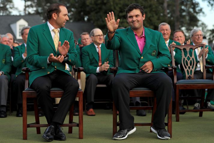 Patrick Reed með sigurvegara síðasta árs Sergio Garcia.