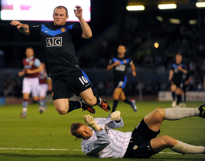 Rooney komst lítt áleiðis í kvöld.