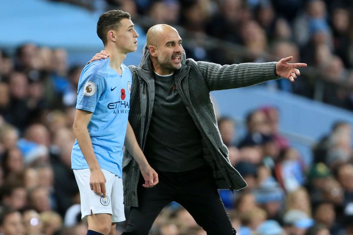 Guardiola fræðir Foden.