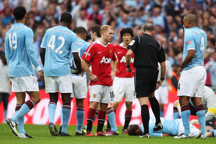 Paul Scholes í leik á móti Manchester City.